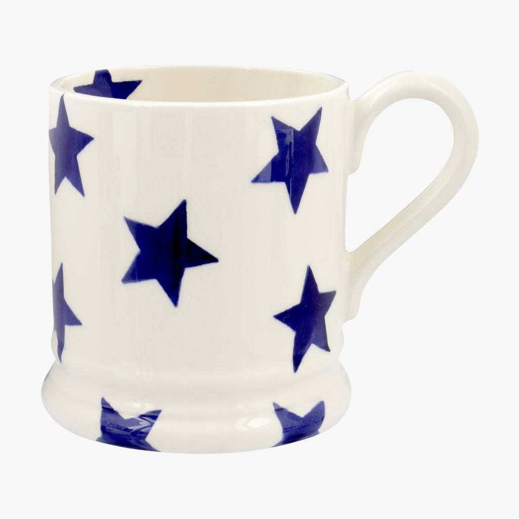 Emma Bridgewater ceramic Blue Star 1/2 Pint Coffee or Tea Mug - made from English earthenware and featuring a blue star pattern hand painted design around the cream mug.