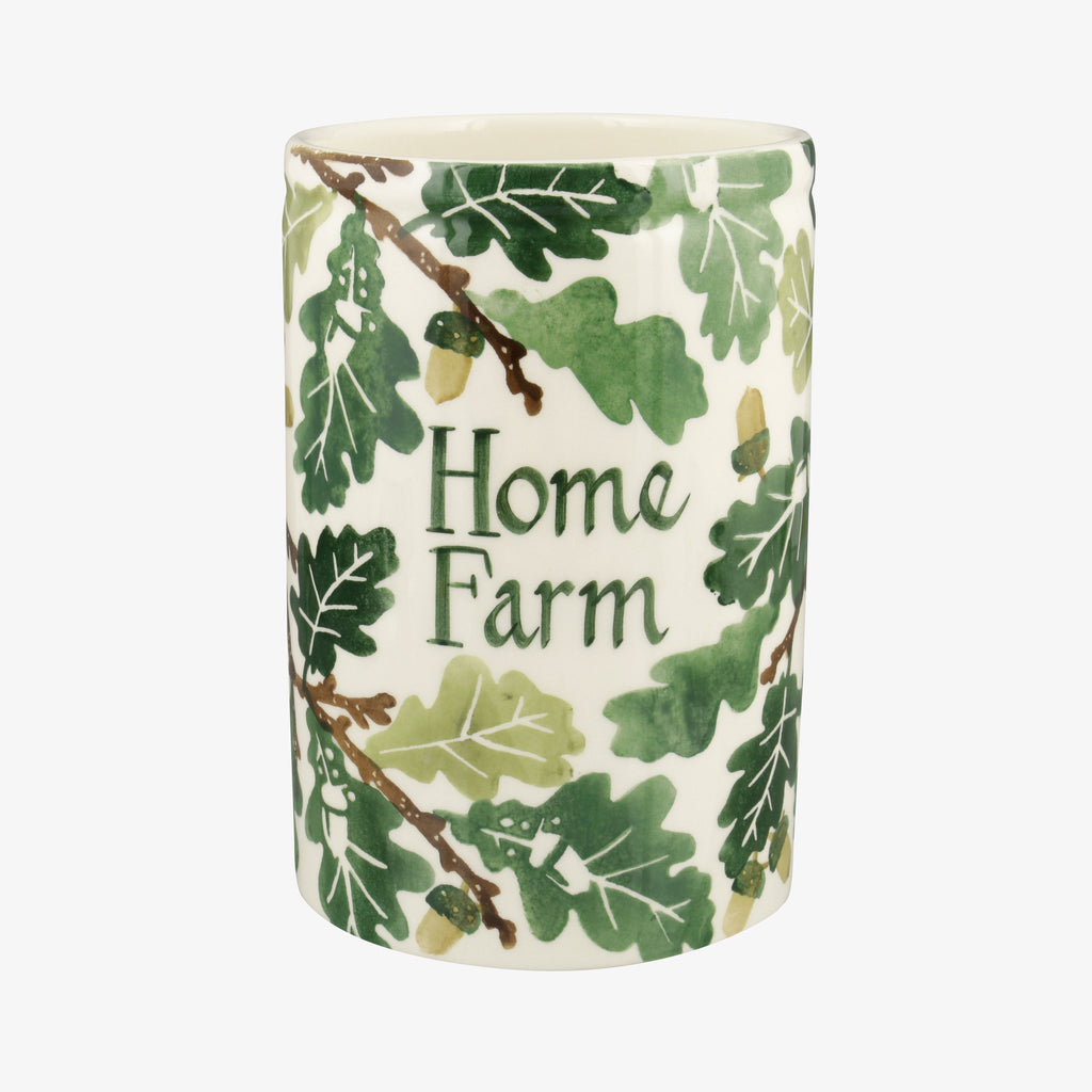 Personalised hand painted ceramic flower vase. Cream coloured pottery flower, plant and decorative vase you can put in your home or gift to a garden lover. Featuring a green leaf print with acorns 